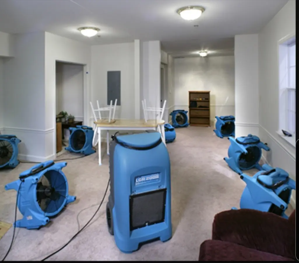 Air movers and dehumidifier setup for Water Damage Restoration in Prairieville